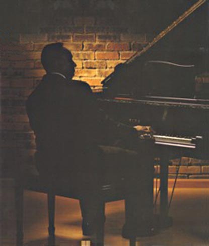 Al at the Grand Piano